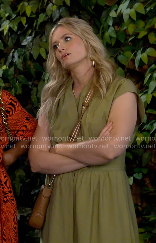 Gemma’s olive green dress with buckles on The Neighborhood