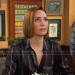 Gwen’s black chain print blouse on Days of our Lives