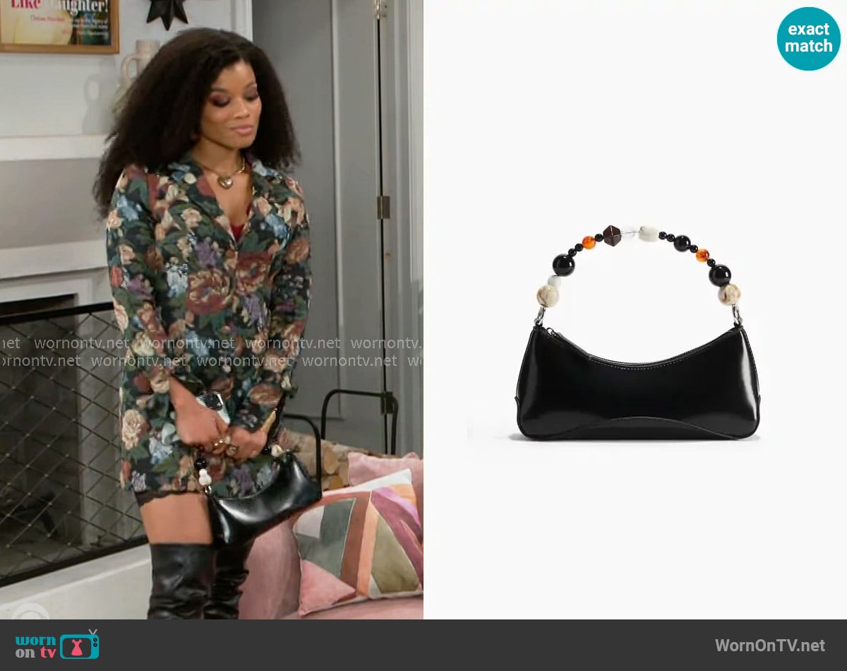 H&M Beaded-Strap Shoulder Bag worn by Eva Thomas (Ambyr Michelle) on Beyond the Gates