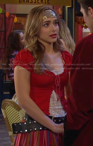 Holly’s red scoop neck ruffle trim top on Days of our Lives