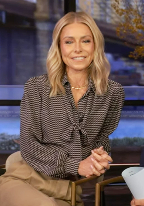 Kelly’s black printed tie neck blouse on Live with Kelly and Mark