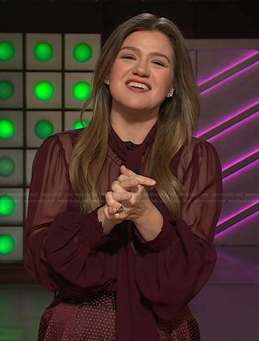 Kelly’s burgundy sheer blouse and pants on The Kelly Clarkson Show