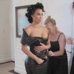 Kim’s black leather dress on The Kardashians