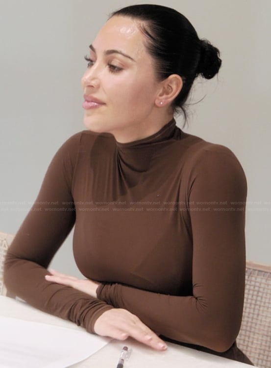 Kim’s brown mesh top on The Kardashians