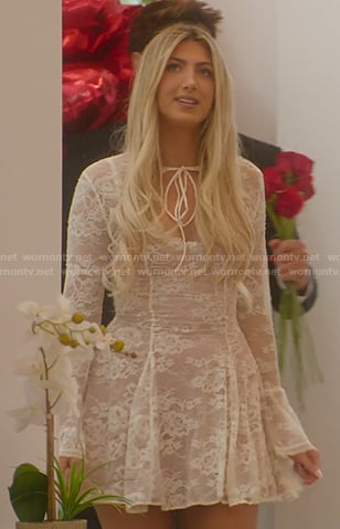 Kitty’s white lace mini dress on Selling Sunset