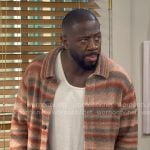Malcolm’s coral striped overshirt on The Neighborhood
