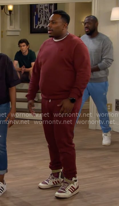 Marty’s burgundy sweatshirt and sweatpants on The Neighborhood
