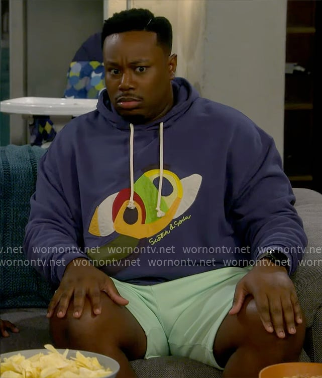 Marty’s colorful applique hoodie on The Neighborhood