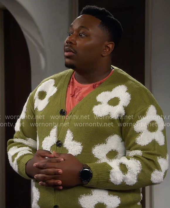Marty’s green flower cardigan and pink cactus print t-shirt on The Neighborhood