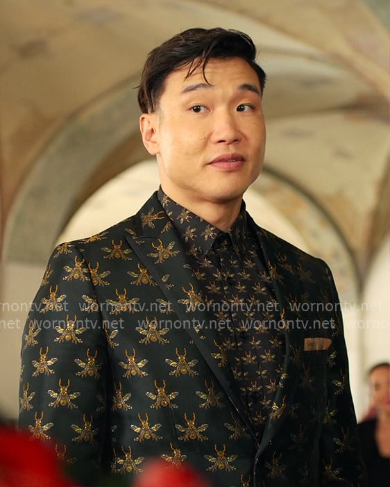 Nicholas’s black and gold bee print suit on Loot