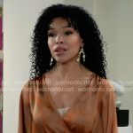 Portia’s orange printed wrap dress on General Hospital