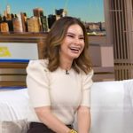 Rebecca’s white ribbed puff sleeve sweater on Good Morning America