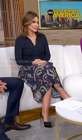 Rebecca’s navy knit shirt and paisley print skirt on Good Morning America