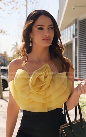 Sandra’s yellow floral top on Selling Sunset