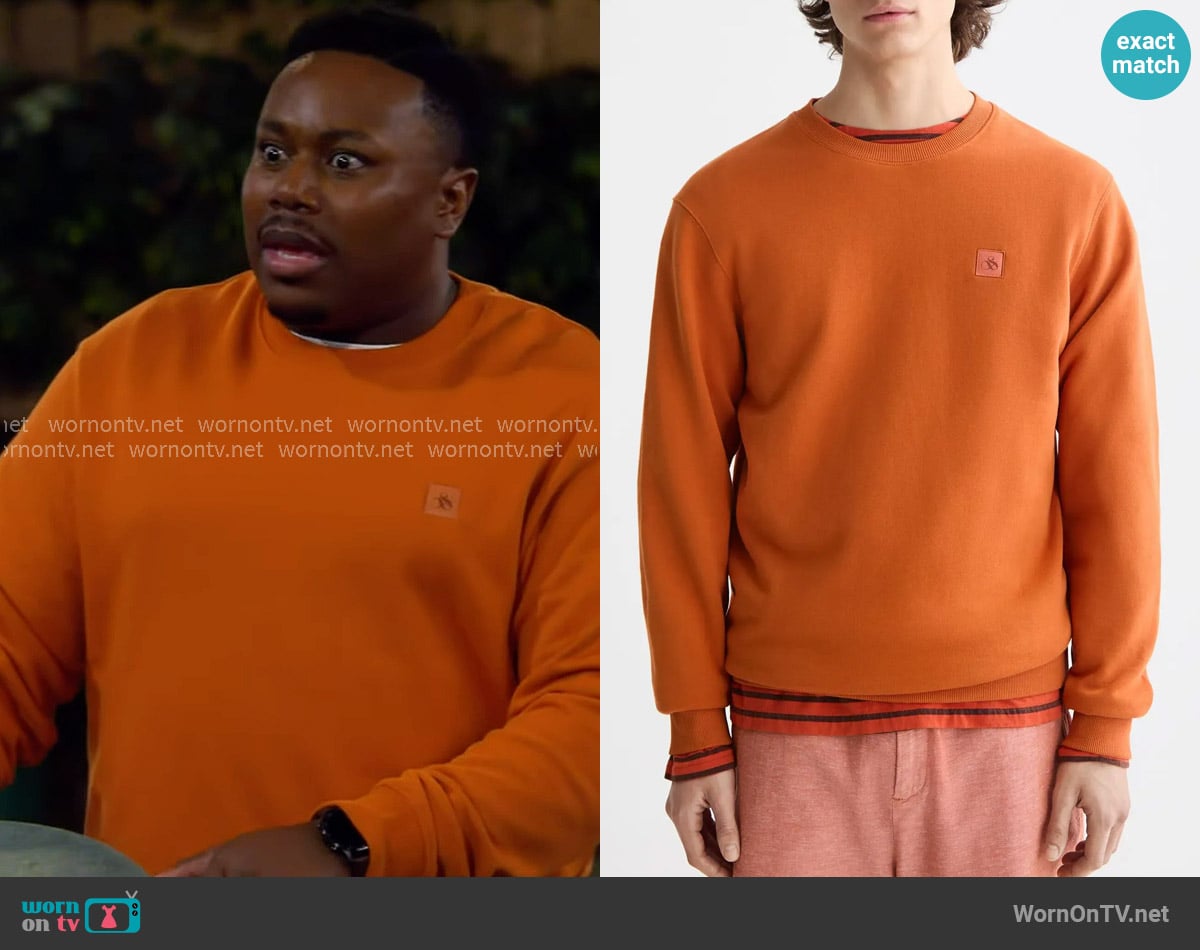 Scotch & Soda Seasonal Core Crewneck Sweatshirt in Rust worn by Marty (Marcel Spears) on The Neighborhood