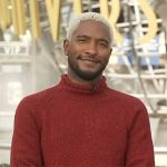 Scott’s red mock neck sweater on Access Hollywood