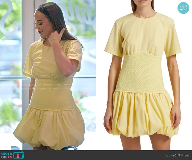 Simkhai Libbie Bubble-Hem Minidress in Buttercream worn by Whitney Leavitt on The Secret Lives of Mormon Wives
