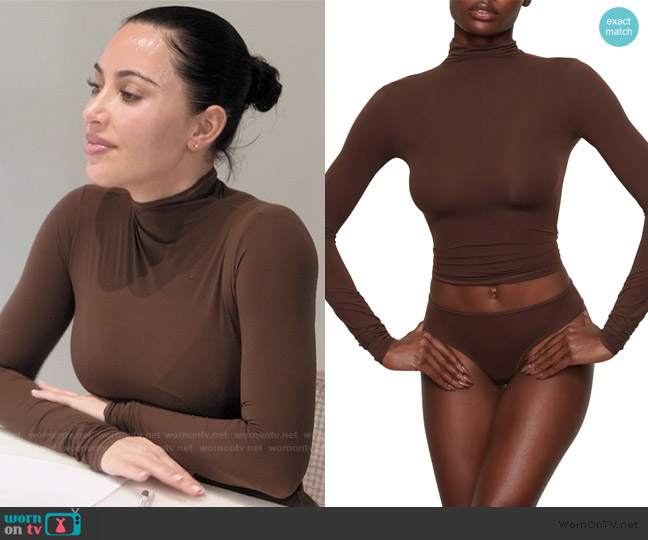 Skims Fits Everybody Funnel Neck Top worn by Kim Kardashian (Kim Kardashian) on The Kardashians
