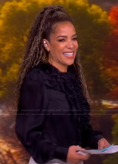 Sunny’s black ruffled blouse on The View