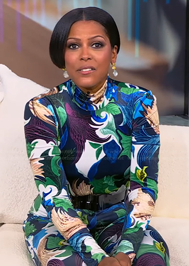 Tamron’s floral print bodysuit and pants on Tamron Hall Show