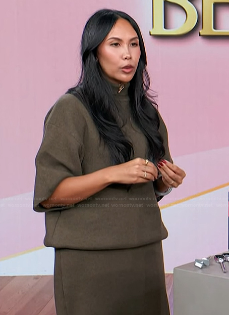 Vanessa Lee’s brown turtleneck sweater and skirt on Access Hollywood