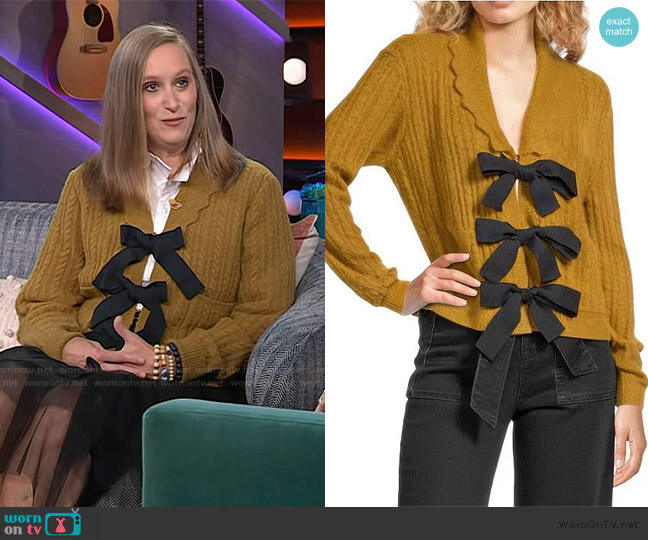 A Loves A Wool Blend Knit Scallop Collar Long Sleeve Bow Front Cardigan Sweater worn by Audrey on The Kelly Clarkson Show