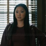 Peyton’s burgundy track jacket on Elsbeth