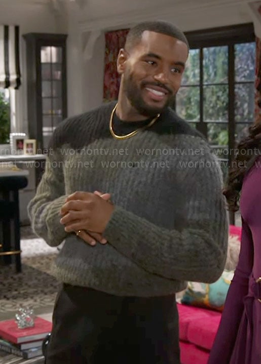 Andre’s grey and green sweater on Beyond the Gates