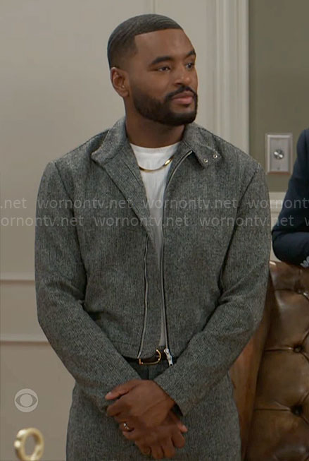 Andre’s grey jacket and pants set on Beyond the Gates