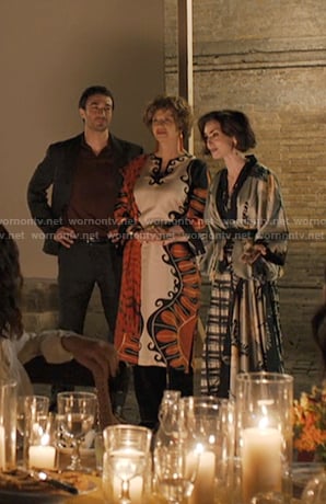 Antonia’s orange and beige print kaftan dress on Emily in Paris