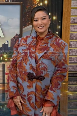 Ashley Park’s blue and orange print coat on Good Morning America