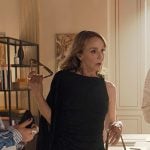 Sylvie’s black one-shoulder draped dress on Emily in Paris