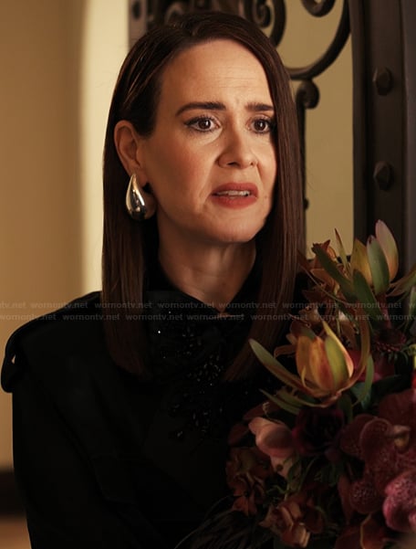Carr’s silver drop earrings on Alls Fair