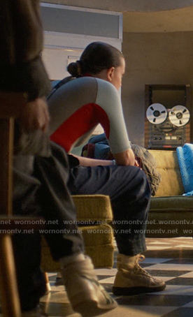 El’s white high cut sneakers on Stranger Things