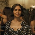 Emily’s navy polka dot shirt and shorts on Emily in Paris