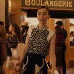 Emily’s printed vest and floral pants on Emily in Paris