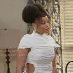 Eva’s white ruched cutout mini dress and houndsooth coat on Beyond the Gates