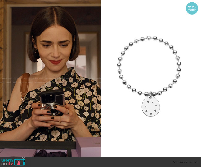 Guzema Eternal Flat Ring worn by Emily Cooper (Lily Collins) on Emily in Paris