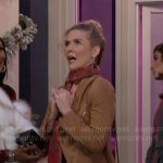 Jan’s tan suede jacket and fringed bag on Beyond the Gates
