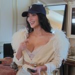 Kim’s feather trim robe on The Kardashians