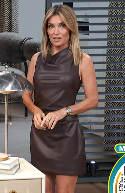Kit’s brown sleeveless leather mini dress on Access Hollywood