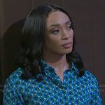 Madison’s blue and green printed shirt on Beyond the Gates