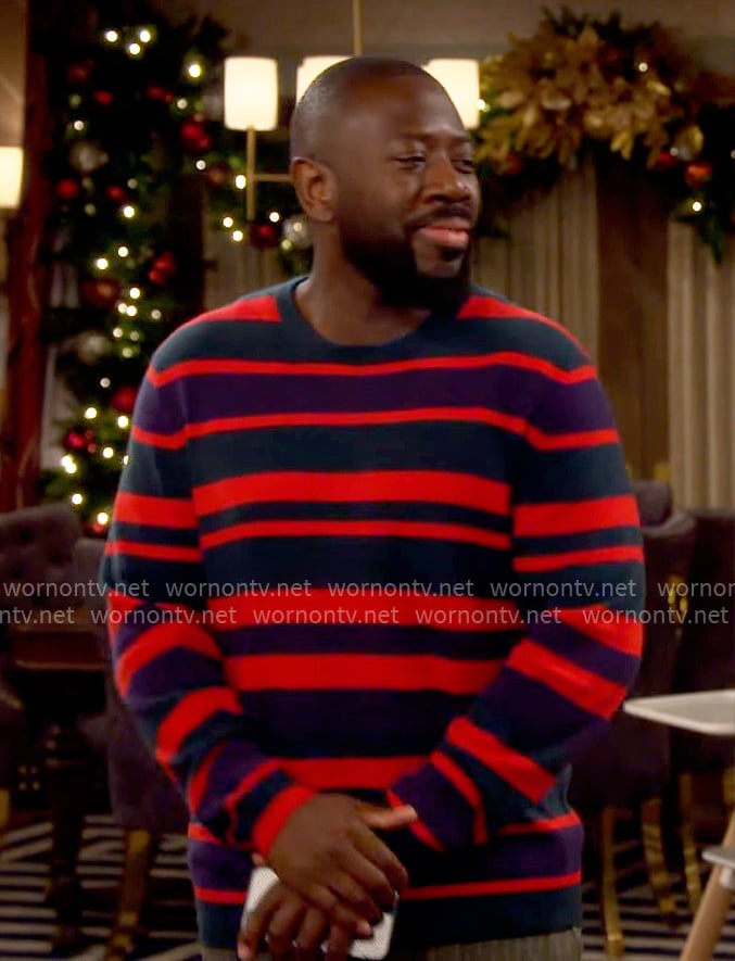 Malcolm’s red striped sweater on The Neighborhood