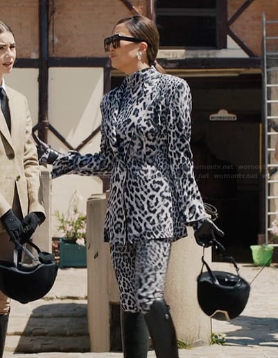 Mindy’s white leopard print blazer and jumpsuit on Emily in Paris