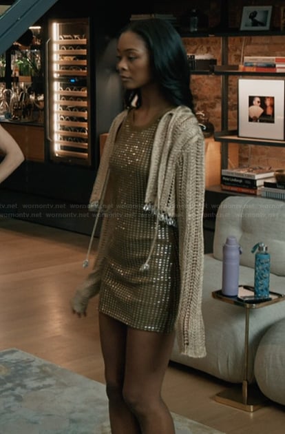 Nabria’s embellished mini dress and cardigan on Elsbeth
