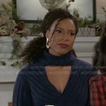 Naomi’s navy blue sweater with buckle detail on Beyond the Gates