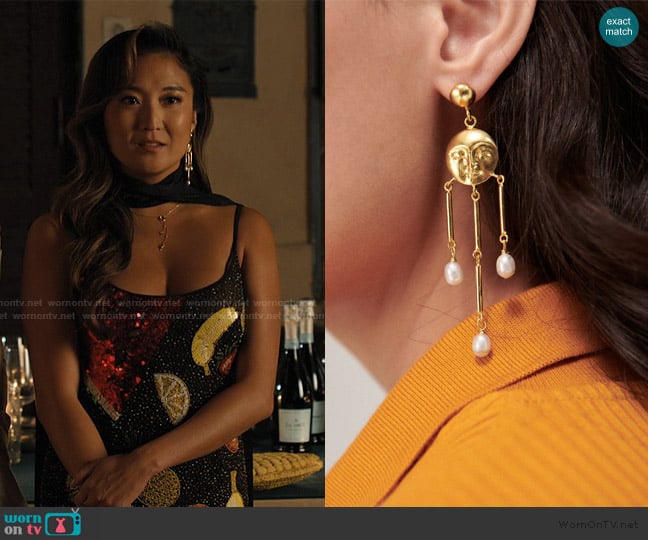 Ottoman Hands Moon Face Pearl Drop Stud Earrings worn by Mindy Chen (Ashley Park) on Emily in Paris