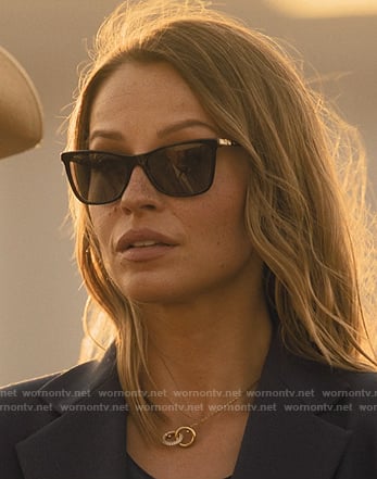 Rebecca’s black sunglasses and bag on Landman