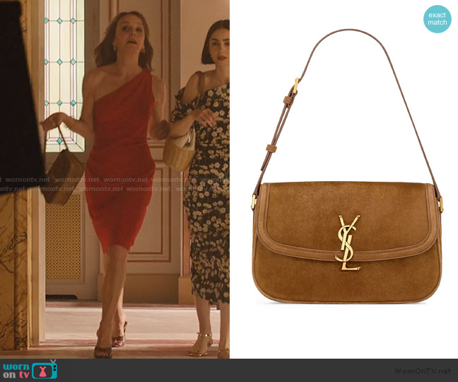 Saint Laurent Solferino Medium Shoulder Bag in Suede worn by Sylvie (Philippine Leroy-Beaulieu) on Emily in Paris