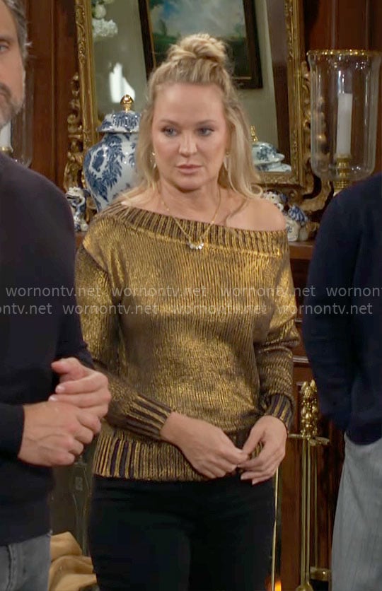 Sharon’s gold one-shoulder sweater on The Young and the Restless